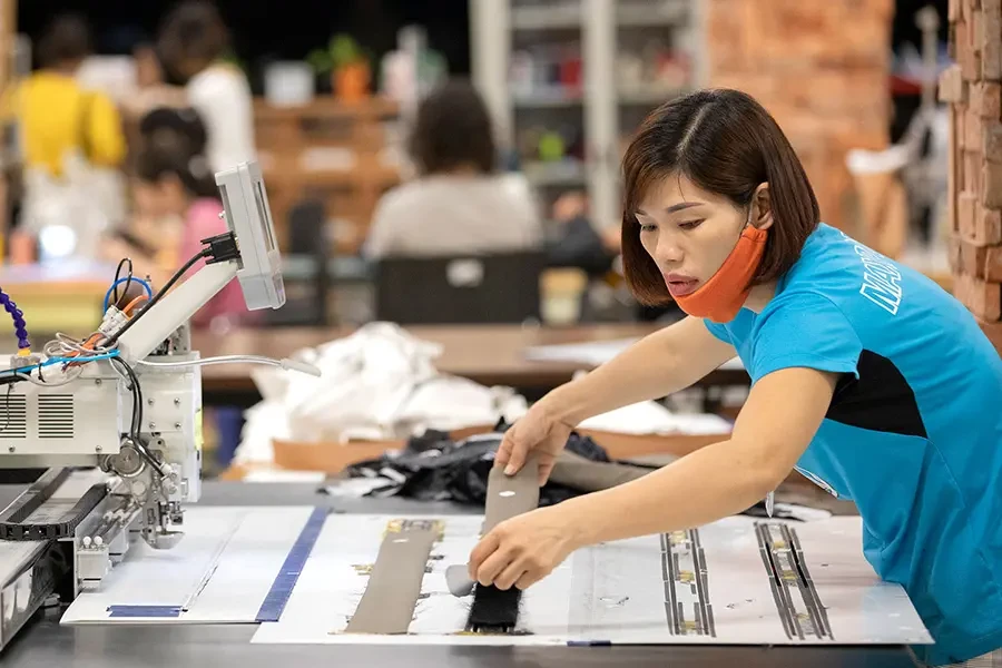Quality Control Process in Bulk Production quality control process in bulk production custom outerwear apparel manufacturer factory